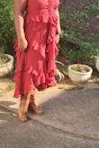 This dresses is absolutely gorgeous.  It is just as pictured. The fabric is lovely. Nice fall color. Love it. - Chipo E.