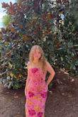 Fit great. It was a bit snug throughout my hip area, but I expected that. I'm about 4'10, so it hit me like a perfect midi dress- a little above my ankle - Darcy B.