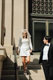 I ordered this dress as my #1 option for my courthouse wedding ceremony with only 2 weeks to spare. I ordered a Large, as they didn't have a Small or Medium in stock. I knew the dress would be too big for me, but prayed it arrived in time to get it altered. 

Luckily, the dress arrived a few days before the wedding (exactly when they said it would). I had just enough time to get it altered, and it ended up being the perfect dress for me! I paid more for alterations than I did for the dress itself, so if you can get it in your size, that would be ideal of course.

There were some wrinkles and minor snags in the fabric after wearing it for a couple of hours, but that's to be expected with satin. - Brigitte K.