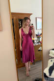 Took others' advice and sized down to an XXS (normally XS). I ordered 2 dresses for an event and ended up returning this one because I liked the other one more. It wasn't the most flattering for my chest, but I think if I had gotten my normal size, it would've looked worse. Love the color! - Rebecca R.