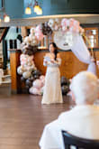 Absolutely loved this dress! I did have to get it hemmed since I'm on the shorter side, but that wasn't a problem! I even kept a little train in the back! I got so many compliments on this dress. The only thing was the sleeves were just a little tight, but overall it was beautiful! - Anna B.