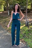 I have this jumpsuit in green and absolutely love it. I bought it again in white, but got a bigger size because the XS is a little tight on me. The small was huge. The torso was too long, and the pant legs were several inches too long, even with heels on. I had to return it for this reason, but if I buy it a third time in the future, I'd get an XS again. - Victoria L.