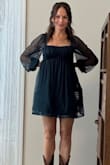 Sheer puff sleeves and empire waist make this the perfect dress for a night out. - Ashley L.