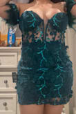 This dress fits beautifully, has very little stretch - Isela V.
