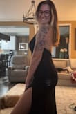 For reference, I am 5'7 and 145lbs. I wore no bra (you could see my nipples if I was cold but you would have had to be looking really hard as the dress is black which helped with that) and I wore "no-show" underwear. I tried the dress on with a regular thong underwear too and you couldn't see the lines either. I wear a 34DD and have breastfed one child, and my boobs felt very comfortable with no bra in this dress! I wasn't even worried about my boobs slipping out and had no side boob. I did have to make sure I tied the neck part as tight as was comfortable to make sure it was secured around my neck to make the dress sit correctly on my boobs. The slit is pretty high up (I have long legs), but it was elegant and comfortable, not inappropriate!! The length is perfect and I wore 3 inch heels so it just graced the floor. I got many compliments and felt really confident and good in this dress! One photo at the wedding event and the other when I was just trying the dress on, since it's easier to see the dress details - Lauren A.