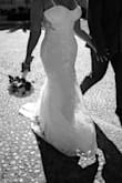 Beautiful dress with great detail! I bought 2 dresses; the other was from David's Bridal. This dress fit better and was more comfortable. I loved how easy it was to put on. - Janet B.