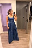 Loved this dress and got so many compliments! I'm 5'5 and wore it with 3 inch sling back pumps, it was slightly hitting the floor. This is a size small. - Marissa C.