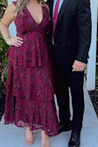 I was nervous to wear this dress because I didn't know how my bust would hold up throughout the event (wedding guest). I used both Cakes (https://cakesbody.com) and b00b tape (https://vbtlift.com/), and they honestly stayed in place well! I ended up ditching the tape by the end of the night, and still didn't have an issue. I ordered an XL, and wondered if I could have tried a size smaller so the bust was held in place tighter, but no big deal. The layers in the dress are also very forgiving- you don't even need shapewear. I got SO many compliments on this dress, and I feel like it photographed well, too! The make of the dress is very high quality. 10/10 purchase. - Kaitlyn S.