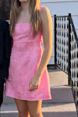 Dress was shimmery, soft, hugged her body beautifully. Perfect for freshman homecoming. Not too short. - Rebecca O.