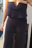 This fits me perfectly. For being 5'8, 175lbs, and a 38c bust, the large nailed it! I got one in navy and black. It hugs, hides, and fits in all the right places. - Julie G.