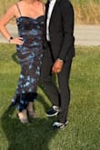 I carry my weight in my belly and found this very flattering. I'm 43 and feel like it's hard to find a dress that isn't for a 21 year old or a 70 year old. This one worked great. Felt a little cheap, but for the price, it did the trick! - Jacqueline W.