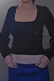 It was cute, but it's a bit crop toppy. The bottom of the shirt will come to the top of your pants unless you are wearing high-waisted bottoms. Not what I was looking for. I don't like to constantly be pulling my shirt down after I bend over. - Jaimie E.