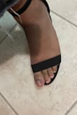 I usually wear a 9 sneaker size but ordered a 10 because that's the size that fits for me in sandals. My toes are sticking out, and I don't like how it looks, so I need to get new ones. Nice pretty heels tho, and will try to order new ones if they get here on time! - Olivia D.