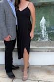 I have now purchased this dress in two different colors for two semi-formal weddings and love them! I feel so confident in them- the slit opens up all the way. I carry weight around my waist and the pleating covers it nicely! - Chellsie J.