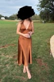 Very cute and worked great as a wedding guest dress. It fit mostly as expected, just a little loose, especially in the bust, but a bit of dress tape mostly solved it. - Jordan O.