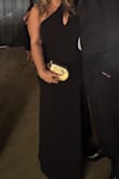 Such a great dress! Bought this super last minute for a wedding & did not disappoint! I usually wear L or XL, but decided to size up XL, just in case. I had some room, but it didn't look big! Had room for a strapless bra and spanx under. Material is a bit thicker and has a lining under. It is a synthetic kind of material though, so keep that in mind. I'm about 5'5 and it hit the floor perfectly with a decent-sized heel! Would definitely recommend, and it's very versatile for any event! The slit is also kind of high, so a bit "much" when sitting down, but otherwise ok standing, etc - Ella P.