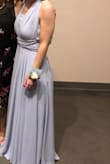 I wore this dress for a formal banquet and loved it! Very flowy and elegant. It was too long on me, but I already knew it would be since I am just 5ft 2in. I had it altered and it was perfect! I love that the top is convertible and I can wear it again in a different style. The color is perfect for any skin tone. - Grace F.