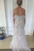 I bought this as an option for my wedding dress. It's absolutely gorgeous, and I was impressed with the quality. I put on some 3" heels, and it was still pretty long, so I planned to get it hemmed. I decided to return it because I realized it wasn't really "me". However, if this is your style, I highly recommend it! - Brooke F.