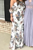 I bought this dress for my senior formal and was in love with the way it fit me. However, 30 minutes before I had to leave for the event, I noticed a giant rip in the side. I figured it came this way and stitched it up. Later into the night, the rip had gotten bigger (past my patch job) and I found several more on the opposite side near my hips. I concluded that this dress was probably not made for as much sitting/movement as I was giving it. There are way too many seams (where the rips occurred) and the material starts to fray when it rips. I couldn't have ordered a bigger size because it would have been too large up top. Everyone kept telling me that it looked like a $300 dress, so I wish it had stayed intact. Bottom line, if you're blessed in the hip area, this dress is unfortunately not for you. - Megan C.
