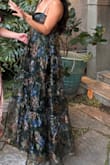 Dress fits well, not a lot of wiggle room. But it tears in different places almost immediately. I wore it for a few hours, not much movement other than walking and sitting, and it has tears in multiple places. - LETICIA B.