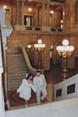 Got this for my courthouse wedding. I cut the little arm ties on the sleeves off, so comfortable and cute. - Gabrielle T.