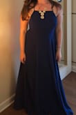 Wore this to a gala and loved it! The fit was perfect and accurate. I loved how this accentuated my waist, and it looked great with a statement necklace. The material feels expensive and the length was perfect for 3-inch heels. 

The only critique I have is that the dress looked a little bit closer to electric blue than navy - but I loved it anyway! - Nikki W.