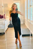 This is a gorgeous dress worn for a cocktail party celebrating our friend's 50th bday. The dress has a bustier top that has great boning to really give you curves, and the draping over the leg with slit gives it a sexy but classy look. I got many compliments. I did buy the dress a month before the event, and ended up losing some weight so I kept pulling the dress up. The size small would've fit me much better than the medium I purchased. I am 5'2 and 127lbs size 34D. - Melissa B.