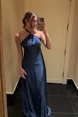 Such a beautiful gown! I wore it to a gala and it was perfect! I am between a small and a medium, so the top on this was sliiiiiightly loose on me, but the small was slightly too tight, especially for the satiny material. Was a tiny bit long on me (I am a little over 5'9), so keep in mind for those that are shorter- you may trip a little. Overall loved this dress and got SO MANY compliments! - Cassy S.