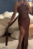 I felt so beautiful in this dress. It fit perfectly, and the straps were surprisingly adjustable. It beautifully masks any lower belly pooch with the ruching. Slit only felt high when sitting, but you could lay it modestly if desired. - Caroline B.