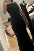 I thought I would love this dress more, but it seemed like a lot of material, and because of the black color it was hard to tell that the material on the back was a bow.  I returned this dress - Sidnee R.