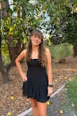 This was a great dress for my daughter's homecoming. She loved the dress. Easy to dance in, fits well. We liked being able to tighten the dress to the best fit for her. She's 15 and 5ft 7inches. She wore Nike Pros under it because it was a bit short, but it worked well. Great dress. Great price and easy returns too. - Farrah H.
