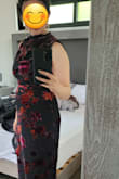 I really like this dress. I read some of the reviews on it, and I was nervous, but I gave it a chance anyway. For me, the neck wasn't choking me, but I did feel like the waist was a little tight. The length was a bit long, too, but otherwise I loved the dress. However, I wore it one time and it ripped on both of the sides. I'm very sad. I don't believe these rips can be repaired either because of the material. - McKayla S.