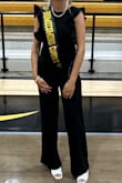 Bought this for my niece to wear in the homecoming parade. I bought two sizes, not knowing how it fits. The small fit her perfectly! She is 5'8 and wears a size 4. It looked so cute on her. I would recommend. - Tracey H.