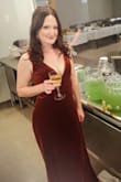 This dress made me feel so beautiful. The color was gorgeous, and I got so many compliments! I should have ordered an x small because the sleeves were a little loose. I'm only 5'2", so it was a little long even though I wore 3 inch heels. It does show a lot of cleavage, so make sure you get a special bra for this dress. I can't wait to order my bridesmaids' dresses with this same material! - Megan F.
