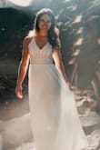 Nice dress, wore it for engagement photos in the mountains. I bought several long white dresses and this was the only one I liked. I did not need to hem this dress. - Robin M.