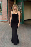 I'm obsessed with this dress! I've always wanted a gown that accented my small waist and larger hips, and this is simply perfection. The stretch meant I could get it smaller, and it clung everywhere I wanted. I wore a 7" platform heel and removed 2" off the length (hassle of being short) to be exactly what I needed. Can't wait to wear it again! - Maria S.