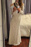 I got married in this dress! I'm short, so I needed to have it hemmed. Other than that, it fits true to size for a small girl like me, and I love it! - April W.