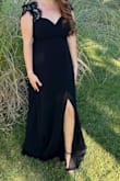 Wore for a military ball. It was really pretty and classy. I had the slit sewn closed a bit and had to get to bottom hemmed. Minus 1 star because some of the stitching on the back lace part was already coming loose before I got to wear it. - Shirley