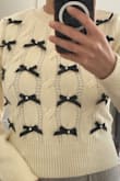 Beautiful sweater. Great quality. Fits more like a shirt because it's fitted. Received many compliments - Dana E.