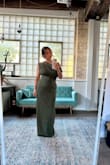 It's a comfortable dress. I felt it was true to size. I'm short, 5'1, so I did have to get it altered. My heels were 4 inches, and I had the dress covering the heels, but the dress has a slit on the side, so the heels were visible as I walked - Eve N.
