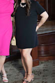It's a nice plain black dress that I wore to a graduation dinner. You can accessorize and make it look less plain if you'd like. Very comfortable and his my belly! - April R.
