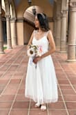 Top had some stretch to it which was nice. Very beautiful dress, received many compliments. - Dora G.