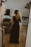 I felt so pretty!!!! This dress is VERY long. I'm 5'3" and this dress had inches on the floor. I didn't have time to take it up, but would work well on a taller woman! Used fashion tape and was able to wear a plunge bra. - Lindsay S.