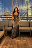 Purchased this for a Black Tie Wedding and it did not disappoint! I received so many compliments! It accentuates your curves, and I love the illusion of the "nude" look, while still looking elegant. There is definitely stretch to the dress as well. The only negative is that I felt the straps did not match the dress. I liked that they were thin but felt very cheap, just didn't match the quality. There was no need to hem, with Stilettos, the dress fell just right. Overall, I HIGHLY recommend, and I cannot wait to wear this to another event. This dress is a show stopper!
5'5", 34DD, 140 pounds - Elizabeth A.