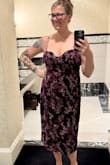 This dress is absolutely stunning; the color and texture are gorgeous. However, the sizing can be a bit tricky. The large felt tight, especially around the side zipper, while the extra-large offered a bit more room in the bust but still had a snug fit. The back tie is a nice touch, allowing for some adjustability and added support around the shoulders and back. - Jamie K.