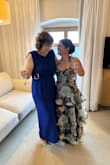 This dress is so beautiful! Colors are perfect. I wore the straps as a halter & tucked the back straps in. I didn't like having the bows tied on my shoulders. Both ways look super cute! Also paired it with a sheer shawl during the ceremony. So much fun to dance in! It shifts with you perfectly! So many compliments. - Courtney V.