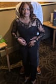 The jumpsuit was not too long which was a surprise! That made me love it even more. The back was a tad tight but still got okay. I received so many compliments. I would love to see other jumpsuits in different colors for petite women. - Amelia H.