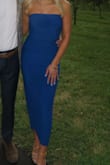 This dress looks exactly like the photo, and the color/fit are perfect! However, I've worn and washed this dress multiple times and the dress turns my purse and nails blue every time I wear it. I've had to throw two purses away because of it, so be careful what you wear it with. - Kristin G.