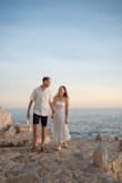 I wore this dress for my engagement photos and it photographed beautifully. Fitted bodice with flowy skirt. Very comfortable and could easily wear it again. - Cydney L.