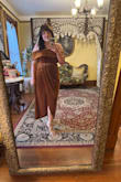 I felt so classy & elegant wearing this dress to my brother's wedding. It was very comfortable and fit true to size. It is more brown in person than in the item picture. My only complaint was that the hanger loops popped out from time to time lol - Anna O.